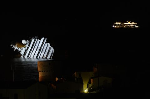 The Costa Serena, the sister ship of the wrecked Costa Concordia, passes by on January 18, 2012.