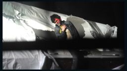 Photos of Boston Bombing Suspect Tsarnaev as he was captured on a boat