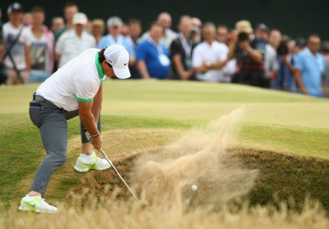 There was trouble in the bunkers for McIlroy. He escapes here but at the 15th he putted from the green into a bunker on his way to a second double-bogey of the day.