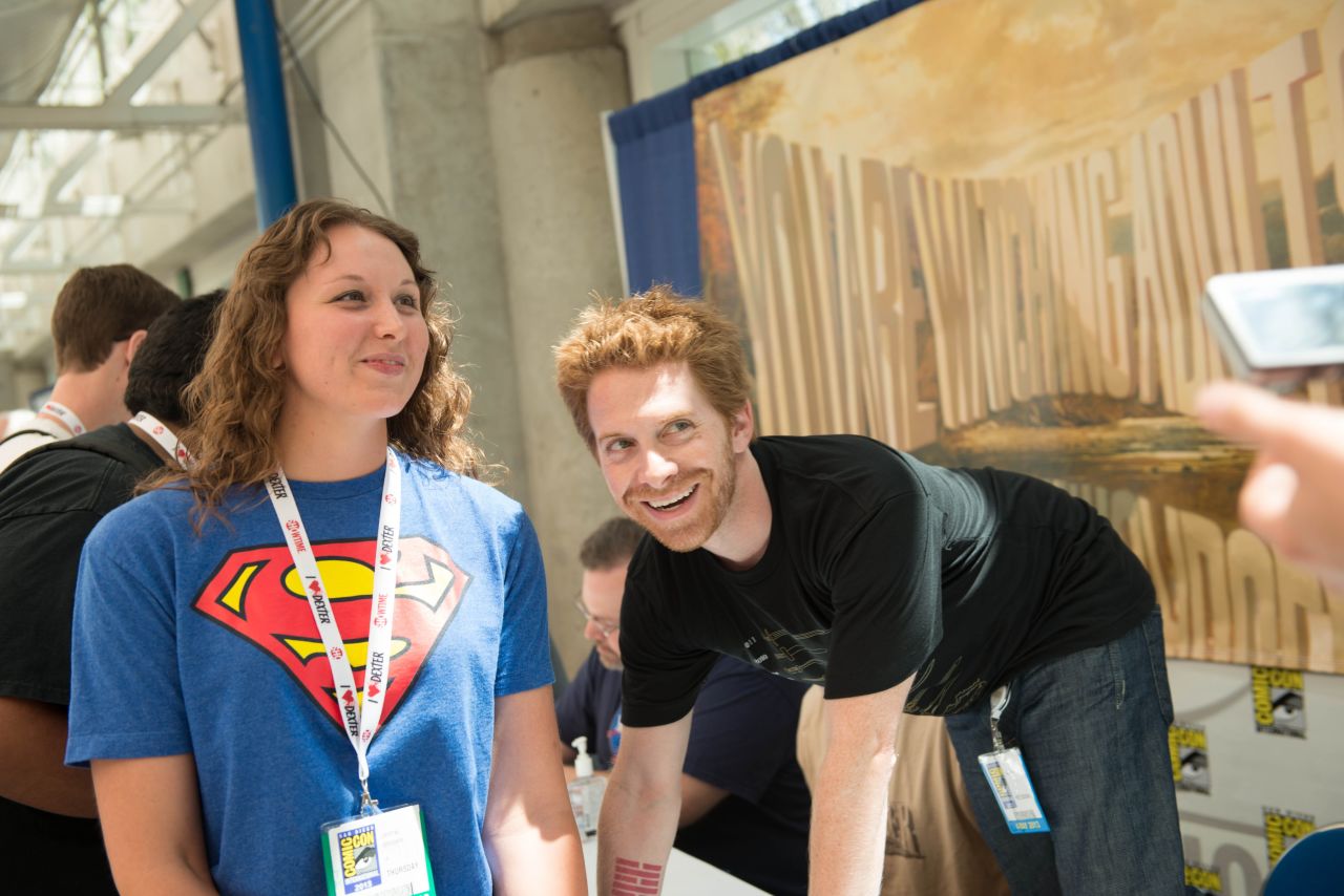 Co-creator/executive producer Seth Green poses with a fan at the "Robot Chicken" signing for the Comic-Con International 2013 in San Diego on Thursday, July 18. 