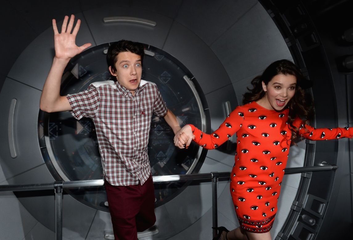 Actors Asa Butterfield and Hailee Steinfeld attend the "Ender's Game" Experience press preview night, sponsored by HGTV, at Martin Luther King Jr. Park on July 17. "Ender's Game" is based on the military science fiction novel by Orson Scott Card, and is set to debut on November 1. 