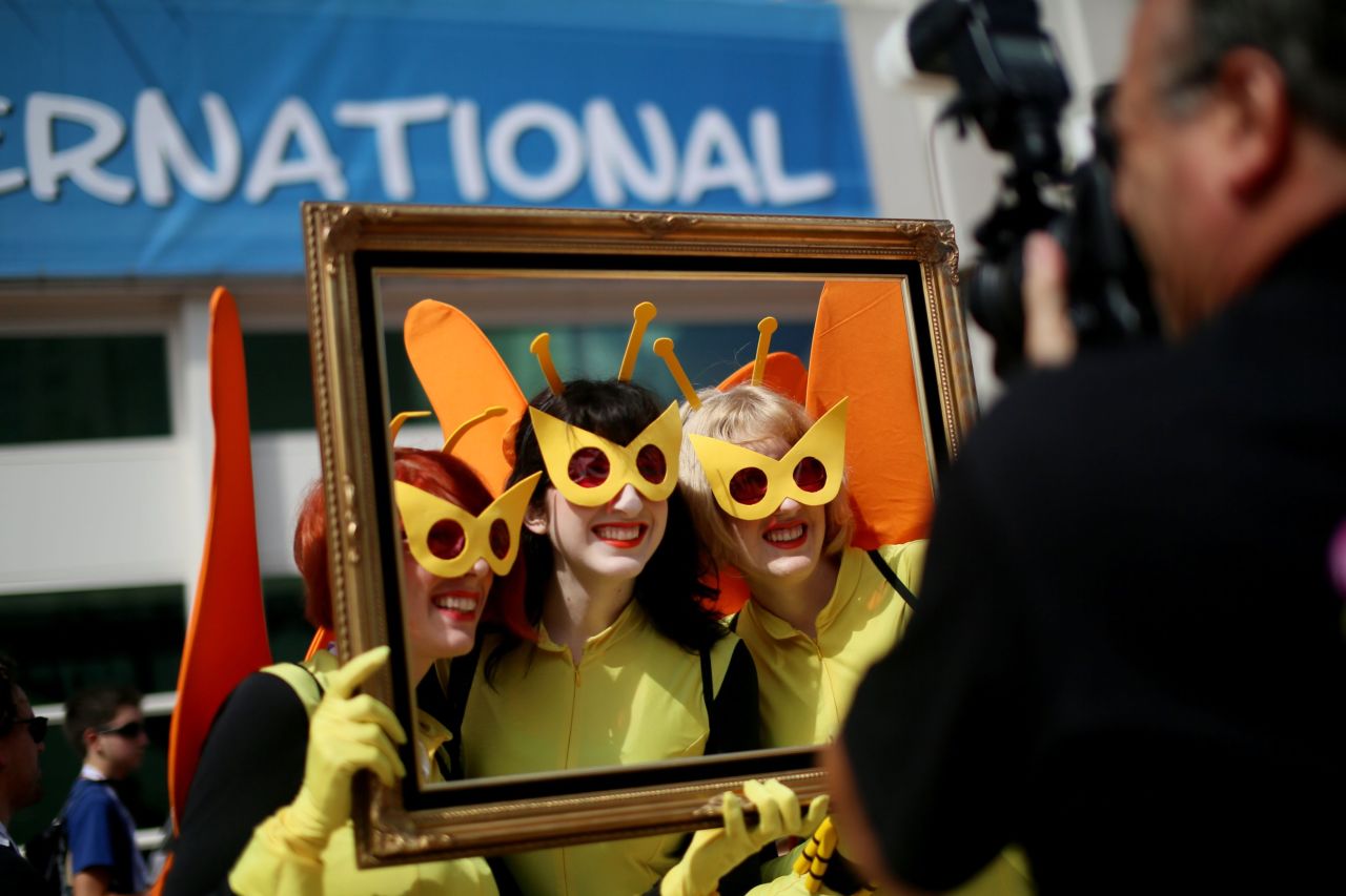 Three women dressed as characters from Cartoon Networks "Venture Bros." pose for a photo on July 19.