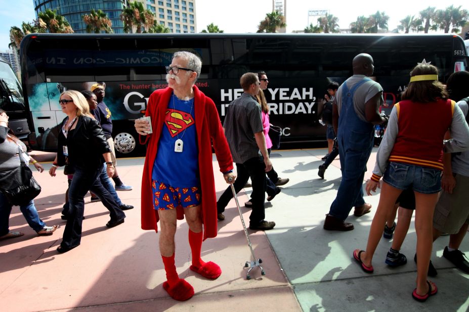 Attendee John Ash wears a Superman themed outfit as he attends the convention on July 19.