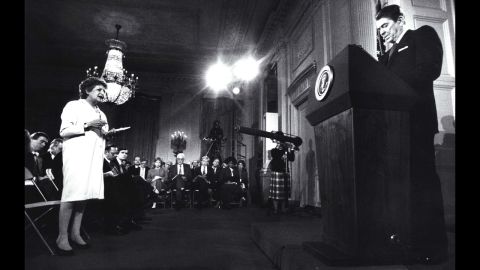 Thomas questions President Ronald Reagan during a press conference at the White House on March 19,1987.
