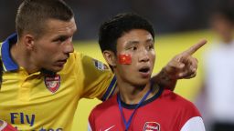 Vu Xuan Tien became Arsenal's unofficial mascot on the Hanoi leg of their pre-season Asia tour after he ran alongside the team's coach for several miles. Tien was then invited to lead the Arsenal players onto the pitch at the My Dinh stadium in Hanoi before their match against the Vietnamese national team, which they won 7-1.