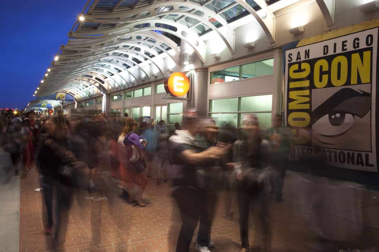 A picture made using a long exposure shows people outside of the San Diego Convention Center on Saturday, July 20.