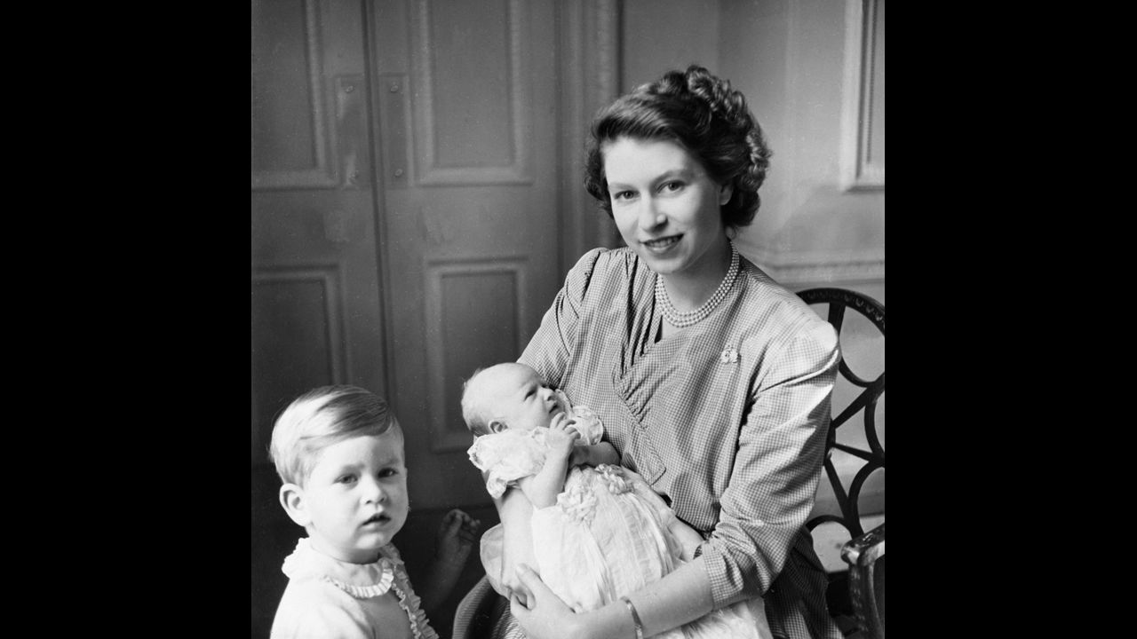 Then-Princess Elizabeth with Prince Charles and newborn Princess Anne in September 1950.