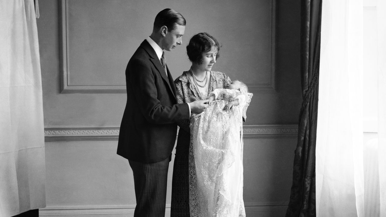 The future King George VI and Queen Mother with their daughter Elizabeth, now queen, at her christening in May 1926.