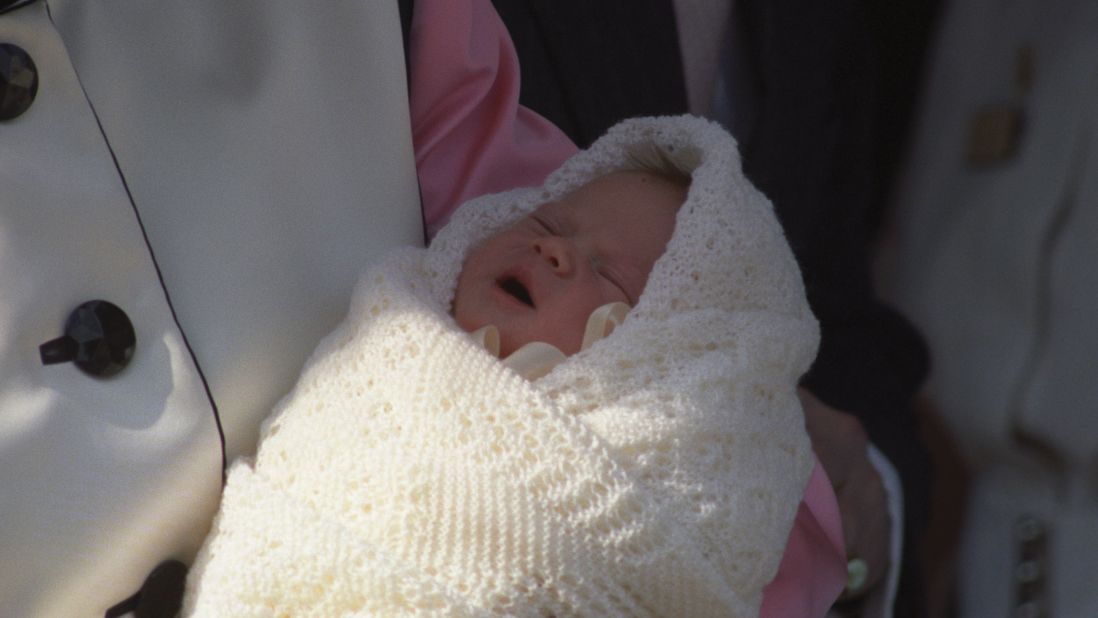 Sarah, Duchess of York, holds 1-week-old Princess Eugenie of York outside London's Portland Hospital in March 1990. She is the daughter of the Duchess of York and Prince Andrew, Duke of York, who is the son of Queen Elizabeth II and Prince Philip.