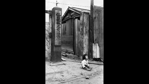 An abandoned girl cries in the streets of Incheon, South Korea, in September 1950.