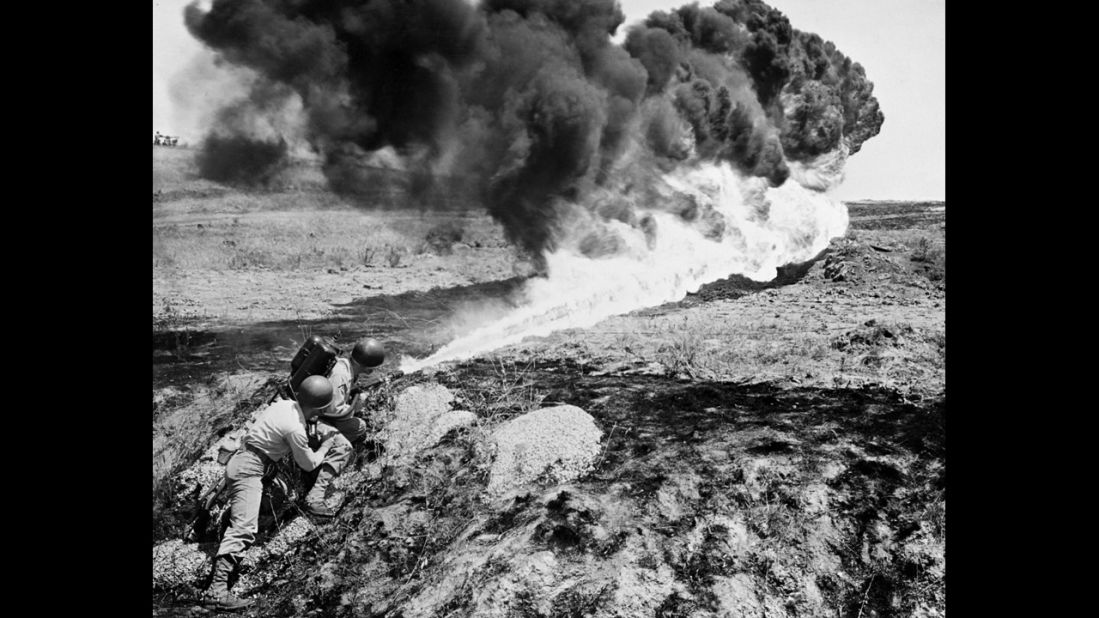 Marines use a flamethrower in April 1951.