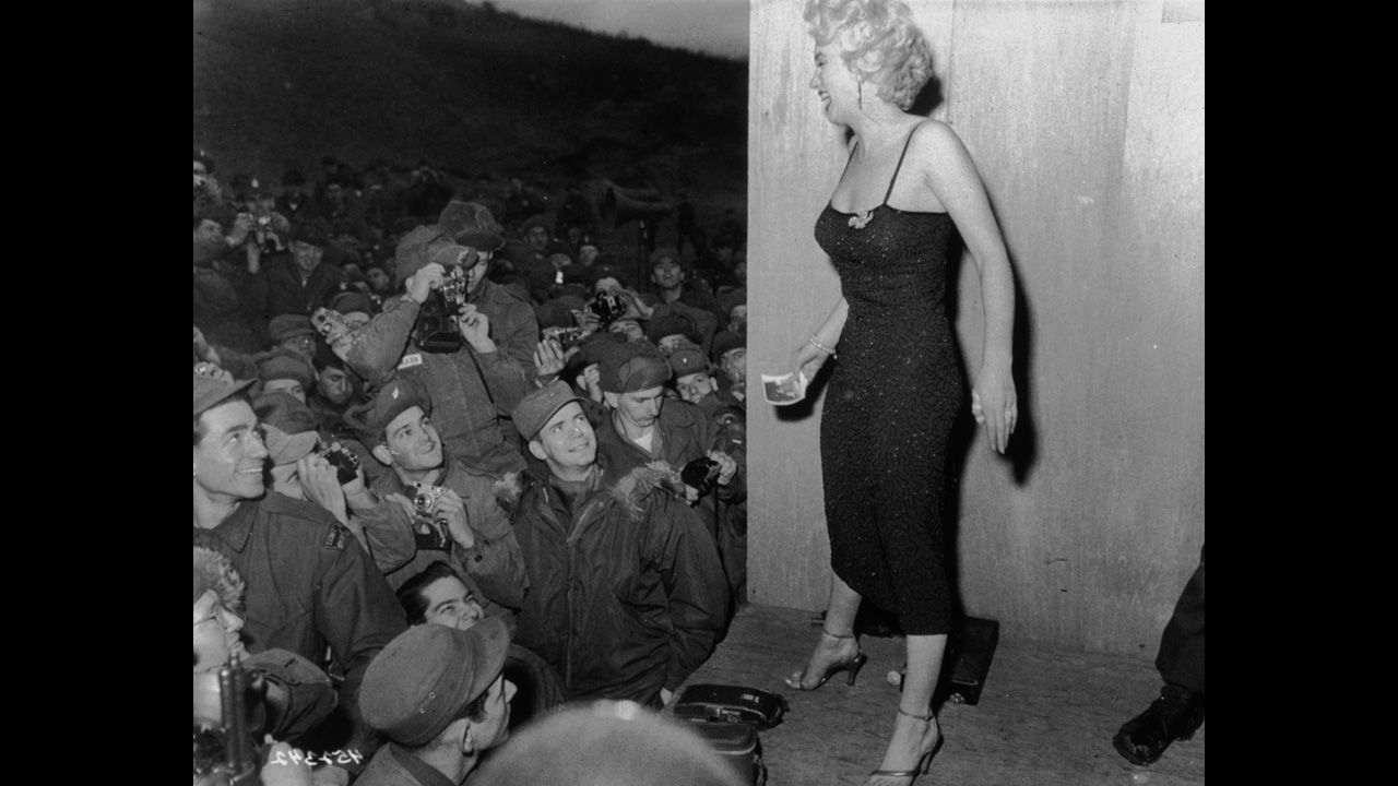 Actress Marilyn Monroe entertains troops, circa 1952.