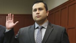 SANFORD, FL - JULY 10:  standing next to his attorney Don West, George Zimmerman is sworn by Judge Debra Nelson during his trial in Seminole circuit court July 10, 2013 in Sanford, Florida. Zimmerman has been charged with second-degree murder for the 2012 shooting death of Trayvon Martin. (Photo by Gary W. Green-Pool/Getty Images)