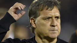 Gerardo Martino has signed a two-year deal at Barcelona after agreeing to replace former coach Tito Vilanova. 