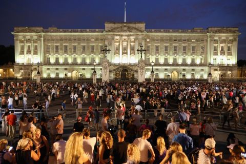 Crowds gather outside Buckingham Palace on July 22 after the announcement of the birth.