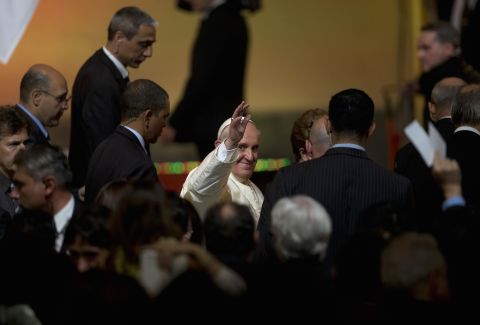 Pope Francis waves to the crowd at the Guanabara Palace on July 22.