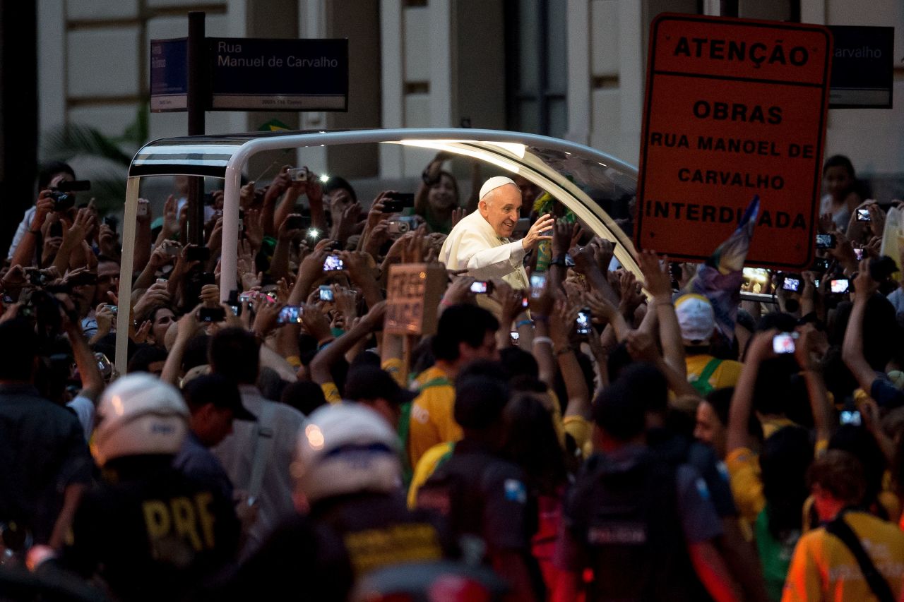 Pope Francis waves to supporters in Rio on July 22.