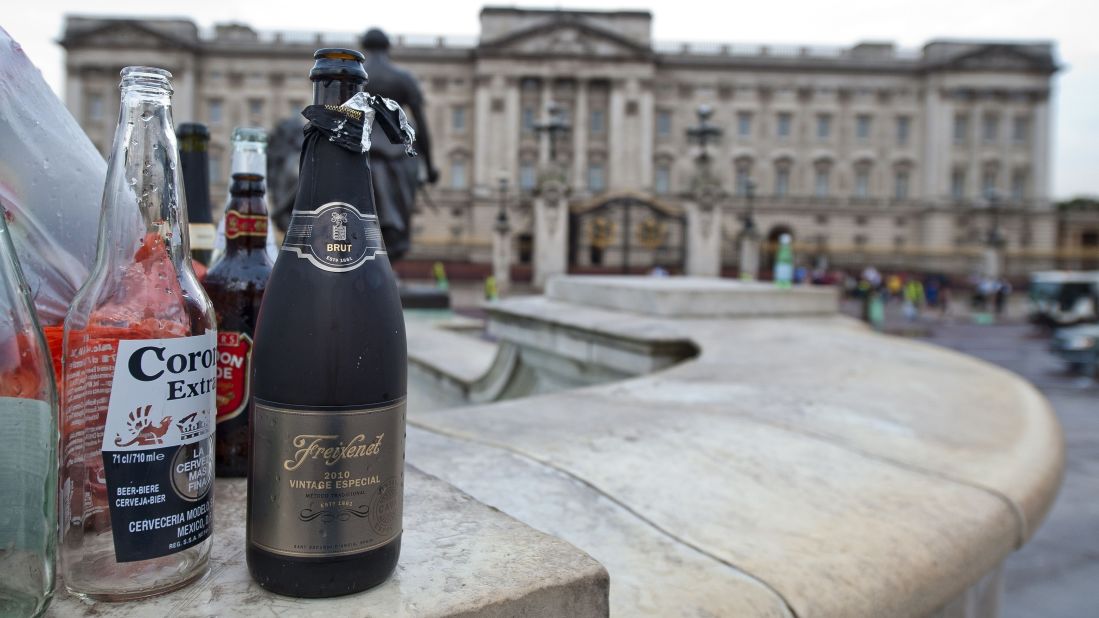 Empty bottles of alcohol sit outside Buckingham Palace in London on July 23.