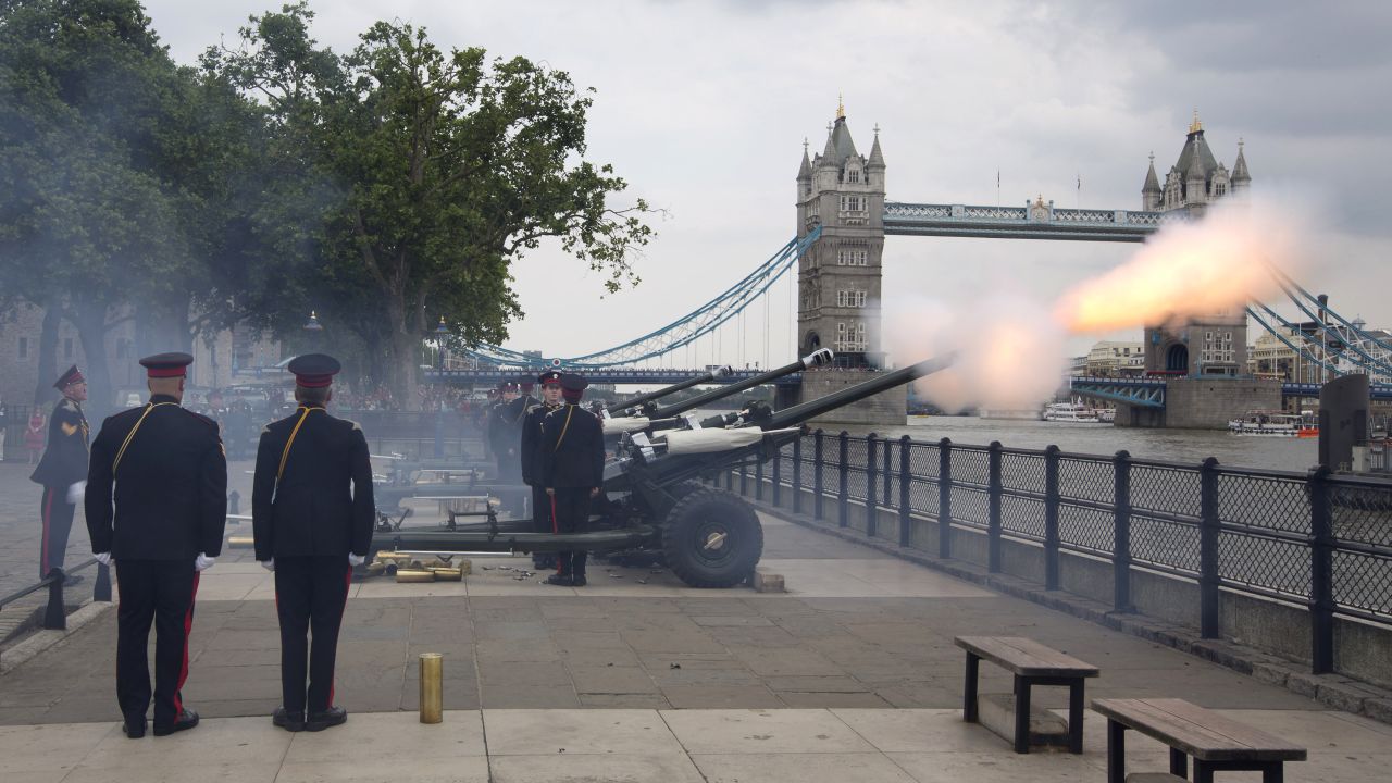 Members of the Honourable Artillery Company fire a salute  at the Tower of London on Tuesday, July 23, to mark the birth of a son to Prince William and Catherine, Duchess of Cambridge.