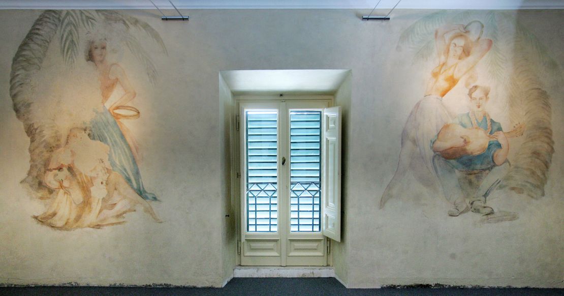 Frescos in Benito Mussolini's Rome residence, where the fascist dictator installed a tennis court and screened films.