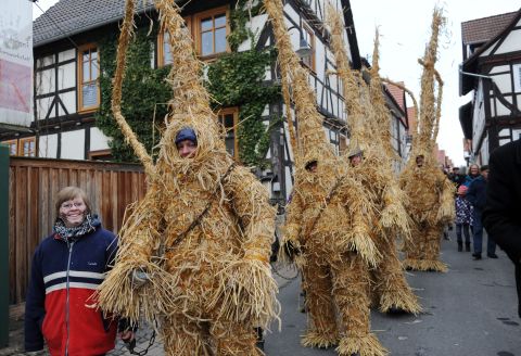 In Whittlesea, England, there was once a tradition on the first Tuesday after Plough Monday to dress a local farmer in a costume made of hay and parade him around the street. The tradition ended in 1909, but was revised in 1980. In 1999, The English 'straw bear' made friends with its German counterpart (pictured). 