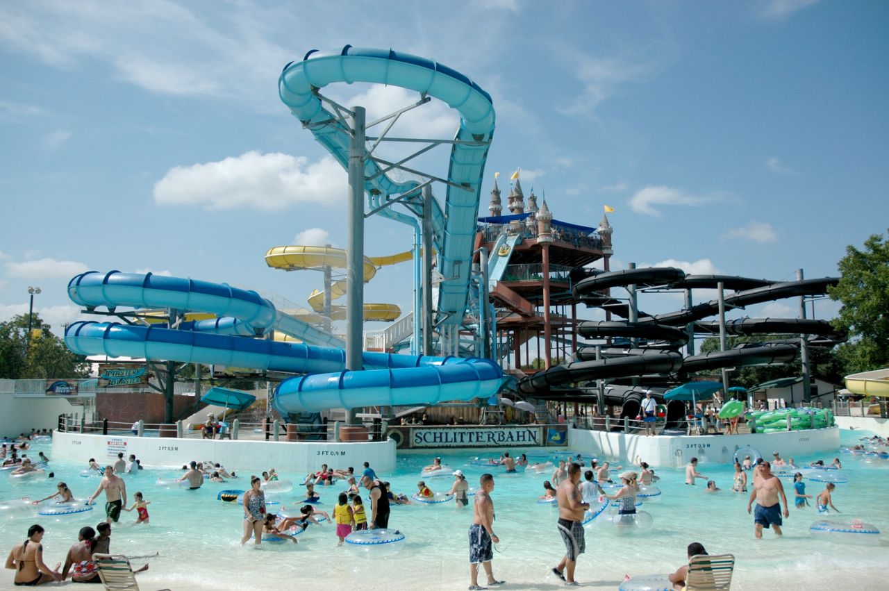 Schlitterbahn New Braunfels Waterpark, founded by the Henry family in 1979, sits along the Comal River in New Braunfels, Texas. Last year, this water park hosted a little over a million guests, the Themed Entertainment Association reported. As a salute to the family's German roots, the Henrys named their park Schlitterbahn, which loosely translated in German means "slippery road."