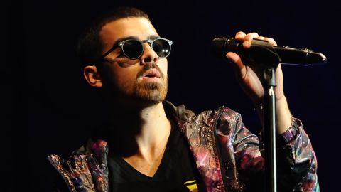 Joe Jonas surprised a class of people spinning to some of his hits. 