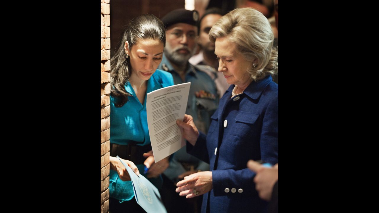 Abedin, Clinton's deputy chief of staff, helps prep Clinton with speech notes on July 19, 2010, before an interview on Pakistani TV in Islamabad.