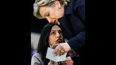Abedin, a campaign staffer at the time, talks with then-Sen. Clinton before a rally in Los Angeles on February 2, 2008.