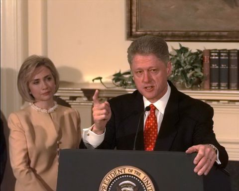 Hillary Clinton was with her husband, former President Bill Clinton, in January 1998 when he denied having "sexual relations with that woman, Miss Lewinsky." However, when he later admitted in August 1998 that the relationship with the intern was "not appropriate," she was not with him and later was chilly toward him during a walk to Marine One. 