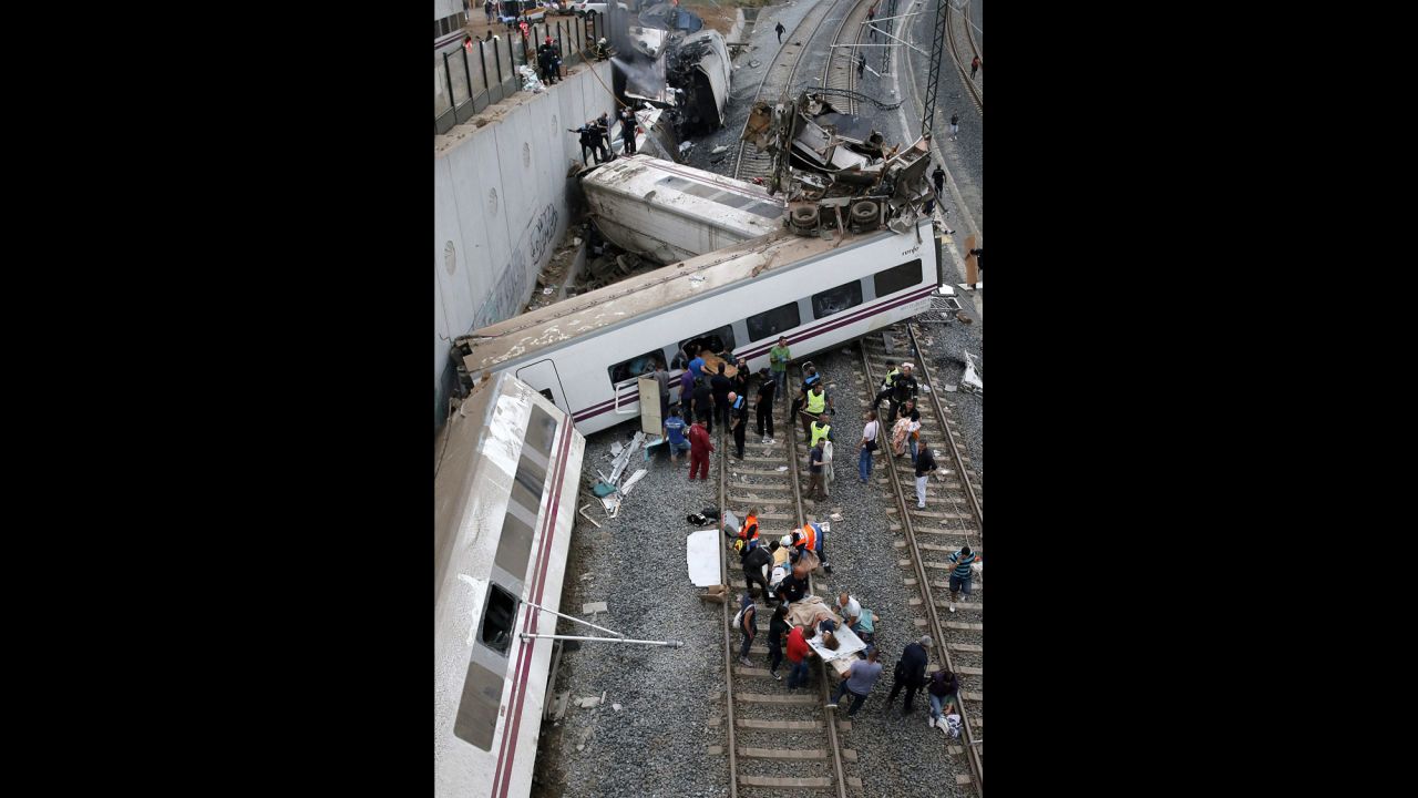 The state railway company said the train derailed on a curve as it was approaching the train station in Santiago de Compostela.