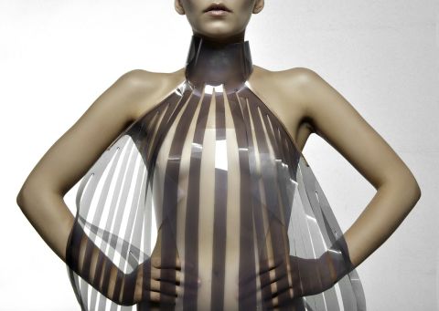 Dutch design collective Studio Roosegaarde have developed a sensual dress called Intimacy 2.0 together with designer Anouk Wipprecht. Made of leather and smart e-foils, it 'explores the relationship between technology and intimacy'. The high-tech panels are stimulated by the heartbeat of the wearer. Initially opaque or white, they become increasingly transparent when exposed to an electric current -- in this case a beating heart.