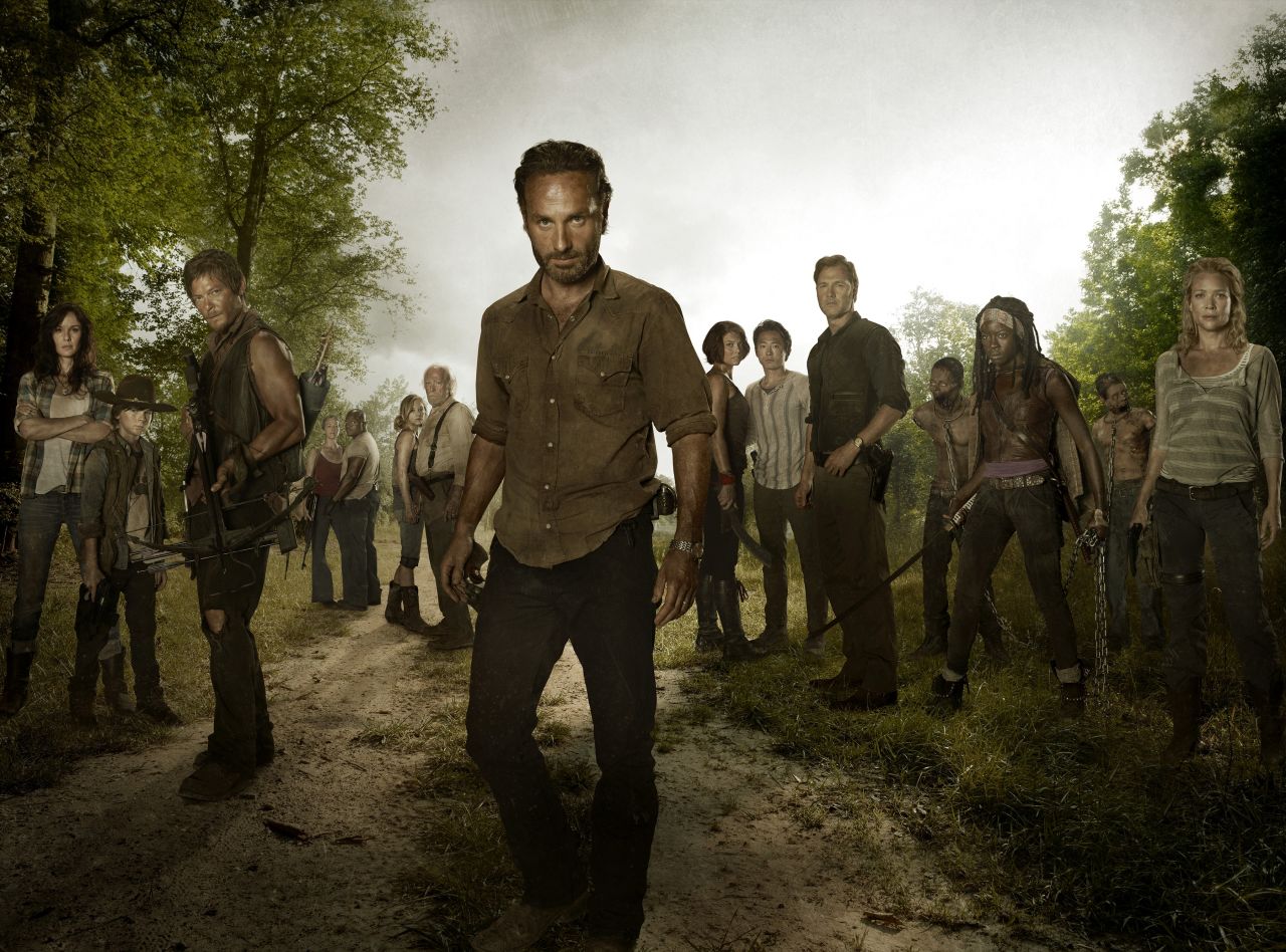 Rick Grimes (played by Andrew Lincoln, center) tries to keep some sense of normalcy in a post-apocalyptic world overrun with walkers on AMC's "The Walking Dead," but characters come and go quickly on the gruesome show. *Spoiler alert!*