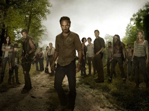 Rick Grimes (played by Andrew Lincoln, center) tries to keep some sense of normalcy in a post-apocalyptic world overrun with walkers on AMC's "The Walking Dead," but characters come and go quickly on the gruesome show. *Spoiler alert!*