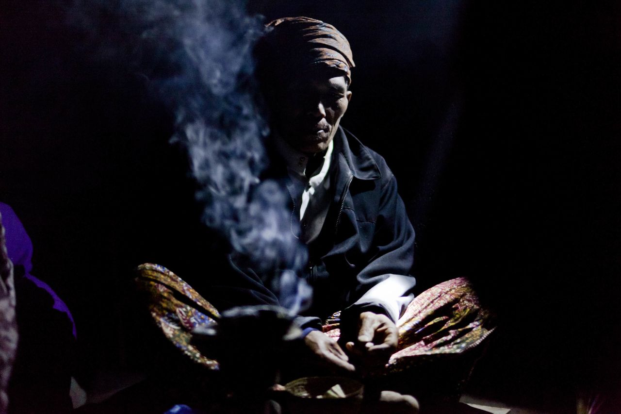 A Tenggerese shaman says blessings during the Yadnya Kasada Festival. Traditionally, shamans are spiritual leaders of the nomadic community.