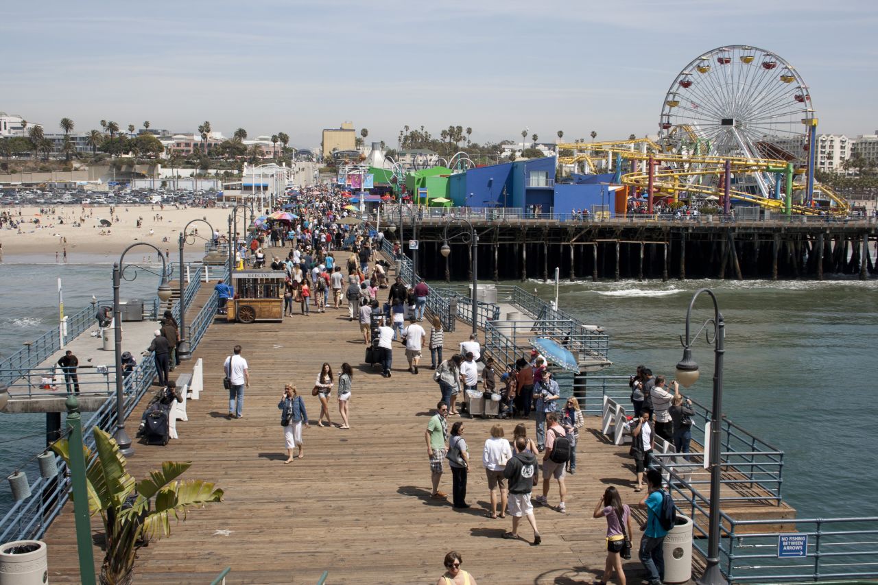 The Santa Monica Pier hugs the Pacific coast. 