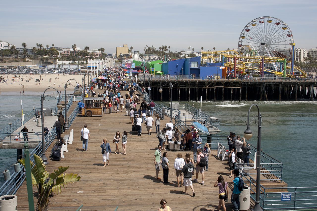 The Santa Monica Pier hugs the Pacific coast.