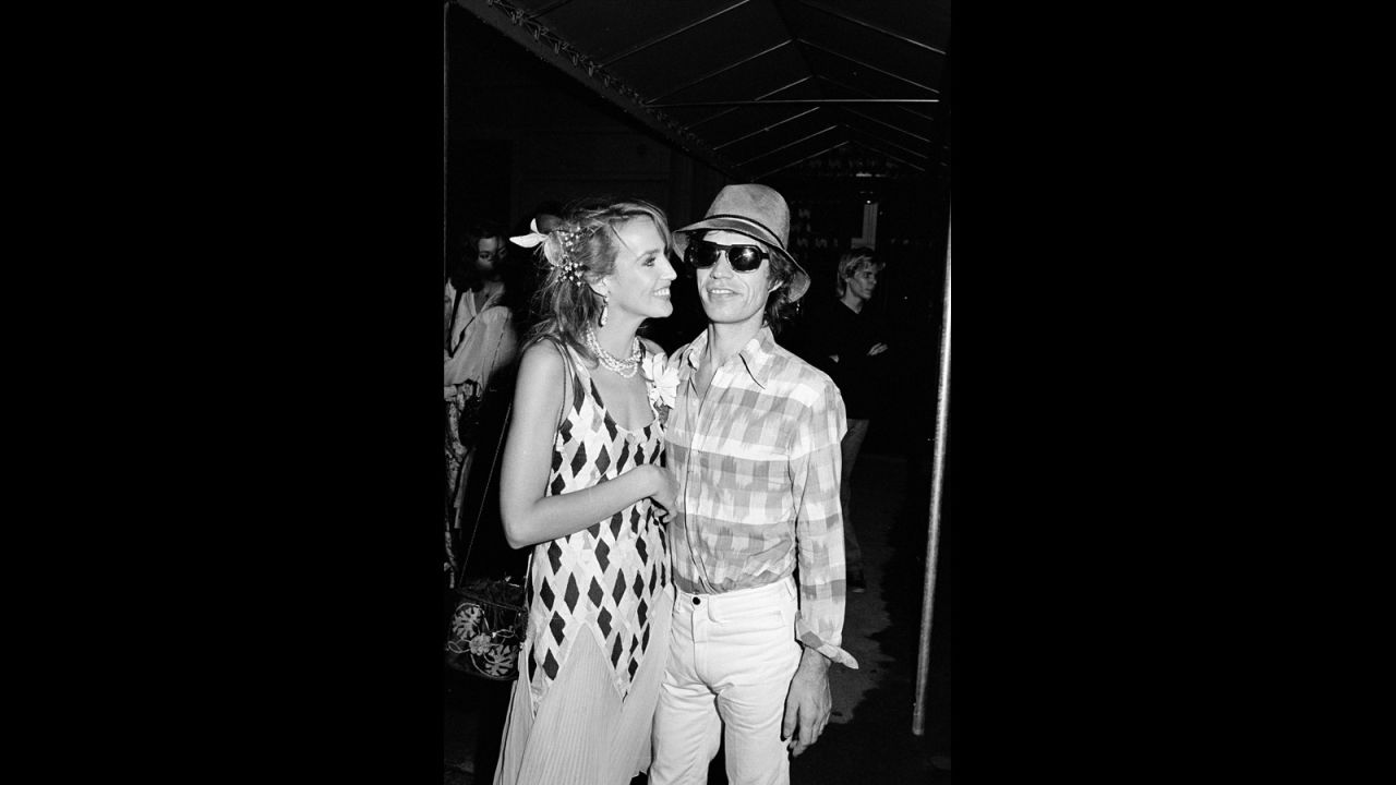In his private life, Jagger also favors slacks that cut a sharp figure. Here, Jagger poses with his now-ex Jerry Hall around 1981. 