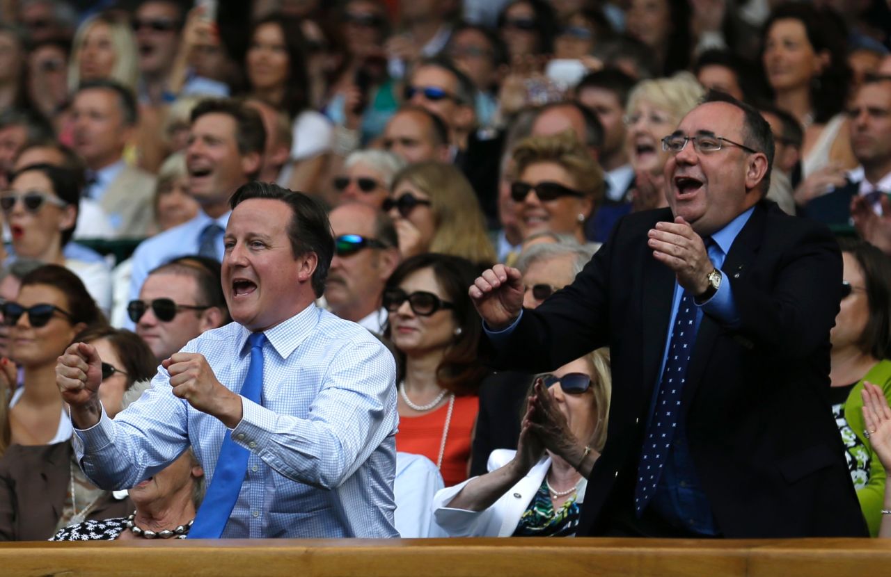 British Prime Minister David Cameron roars on Andy Murray to victory in the 2013 Wimbledon final. 