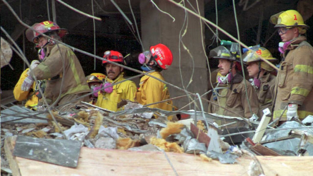 Emergency workers sift through the rubble of the Alfred P. Murrah Federal Building in downtown Oklahoma City, OK.