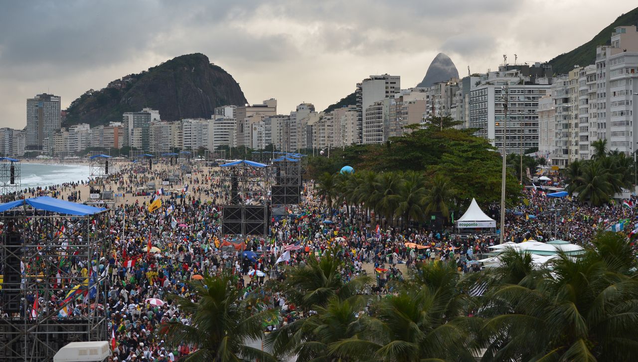 Thousands of young people gather at Rio de Janeiro's iconic Copacabana beach on July 25 to welcome the pope.