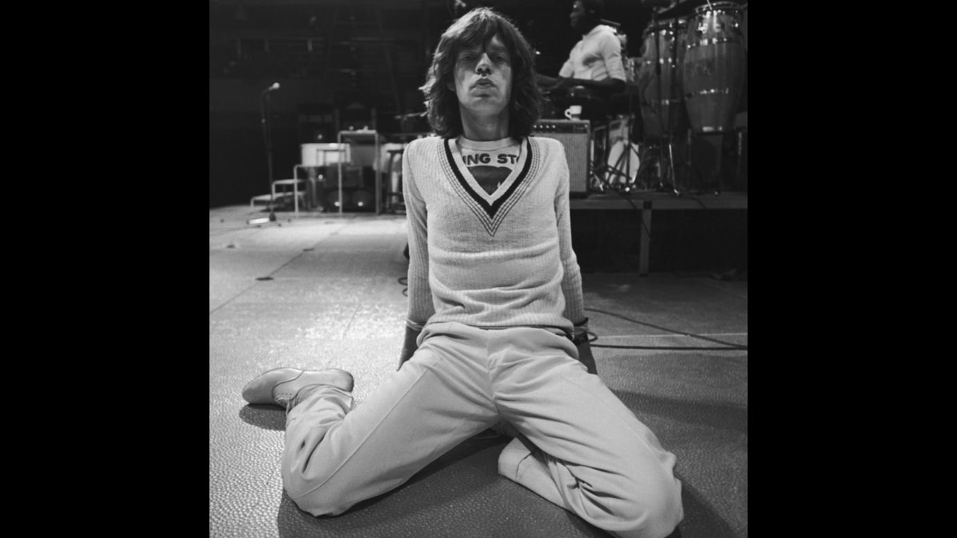 Jagger takes a break during rehearsals for a show in 1975.