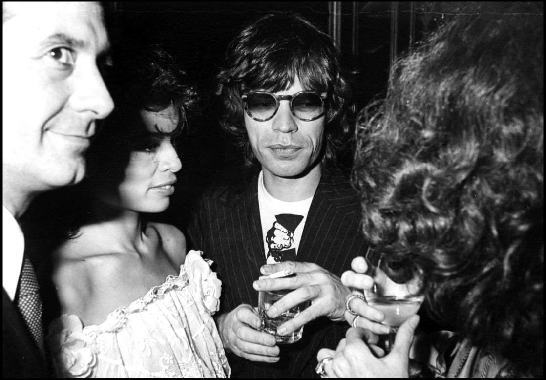 Jagger and his wife, Bianca, spend an evening at Chez Castel in Paris in 1977.