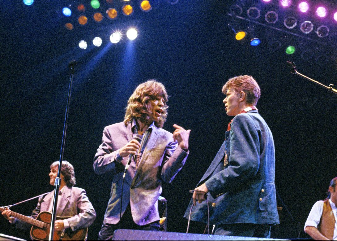 From left, Paul McCartney, Jagger and David Bowie take the stage together at London's Wembley Arena in 1986.