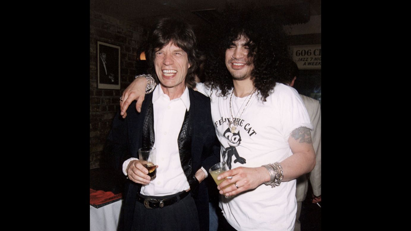 Jagger parties with Slash, the Guns N' Roses guitarist, at a club in London in 1996.