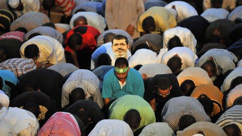 Morsy supporters say evening prayers during a rally July 25 outside a Cairo mosque.
