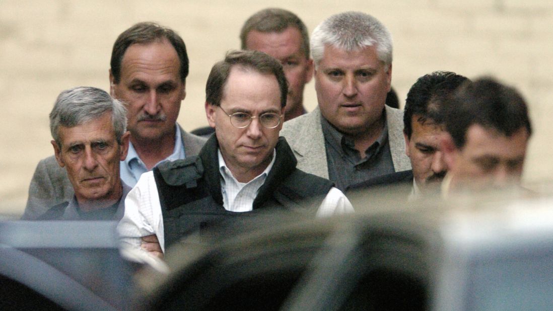 Nichols is escorted out a courthouse in McAlester, Oklahoma, in 2004. He was sentenced to 161 consecutive life terms without the possibility of parole.