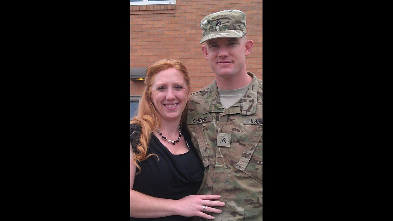 Carter and his wife Shannon Derby share his last moments at Joint Base Lewis-McChord before he boarded a bus for his second deployment to Afghanistan.