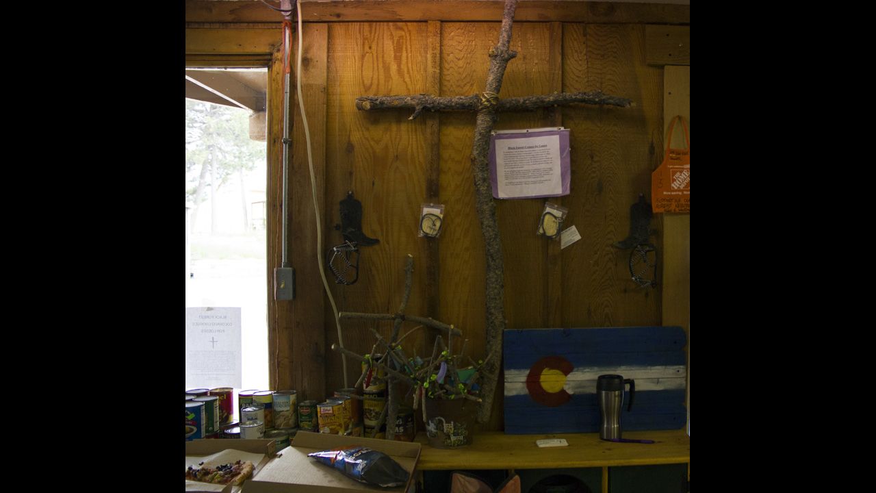 Davis started Crosses for Losses after making crosses out of branches in Black Forest and selling them to benefit the local fire department. She now distributes donations to fire victims out of a building in the center of the community.