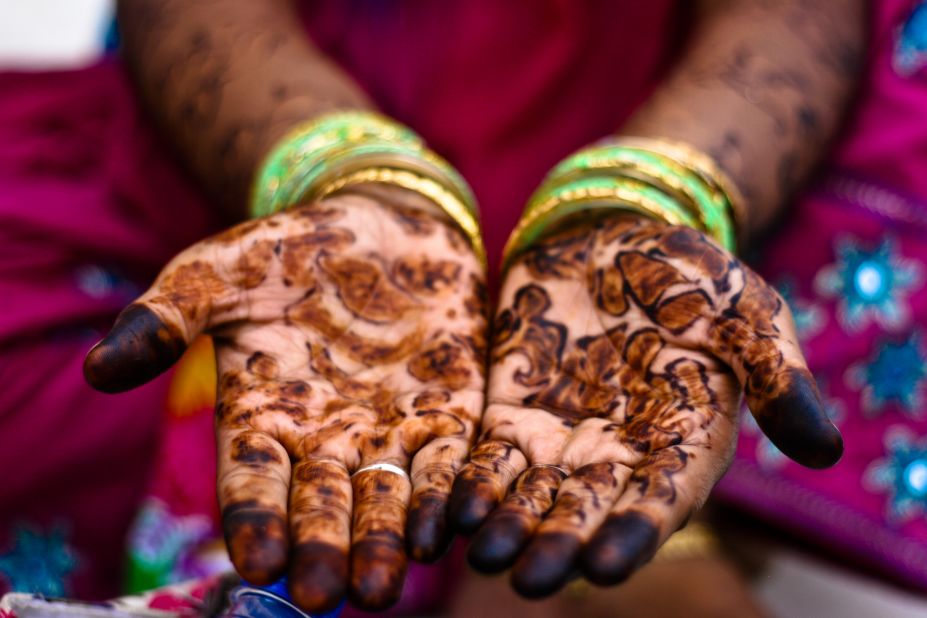 During an Eid spent in India, Laurens Meulman, 35, from the Netherlands, spotted an irresistible photo-opportunity after she'd been invited to share food with a family in a square behind the Taj Mahal. "The henna-painted hands of one of the women in the group caught my eye and I asked her if I could to take a photo," she said.  